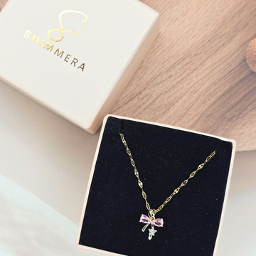 Anti tarnish 18k Gold plated cubic zirconia bow pendant with chain