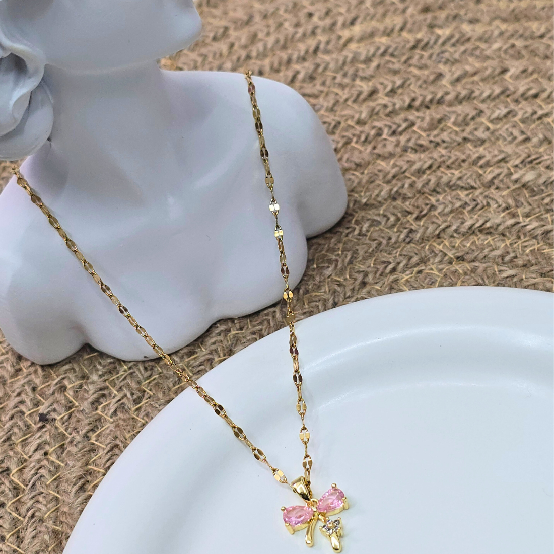 Anti tarnish 18k Gold plated cubic zirconia bow pendant with chain