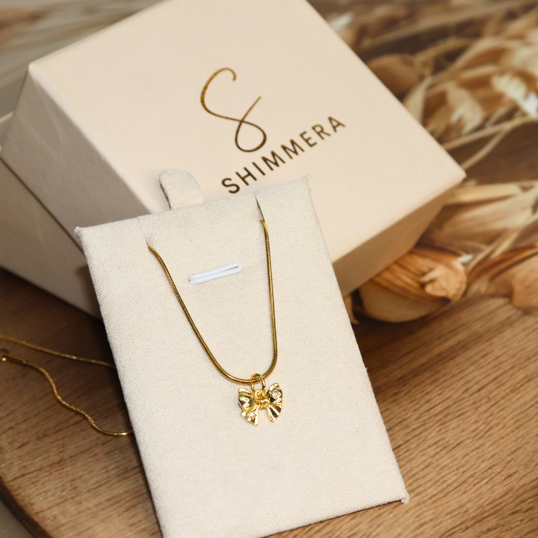 Premium Anti tarnish 18k Gold plated minimal bow pendant with chain