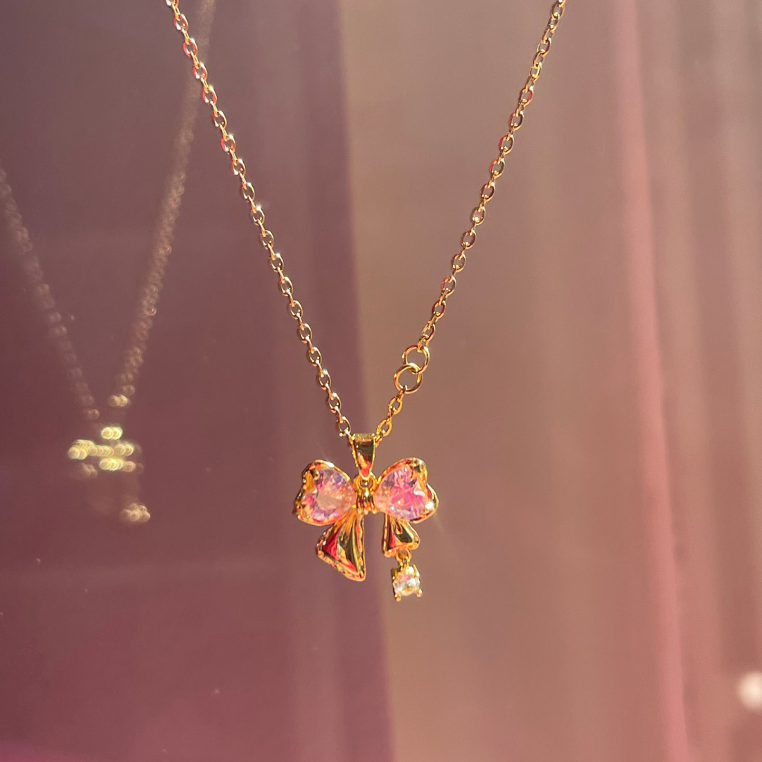 Anti tarnish 18k Gold plated stainless steel bow pendant with chain Success